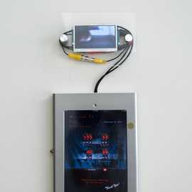 iPad wall interface by Bryan Leister | dimensions variable | 30 analog video monitors 7 video splitters iPad iMac | A Message For Survivors